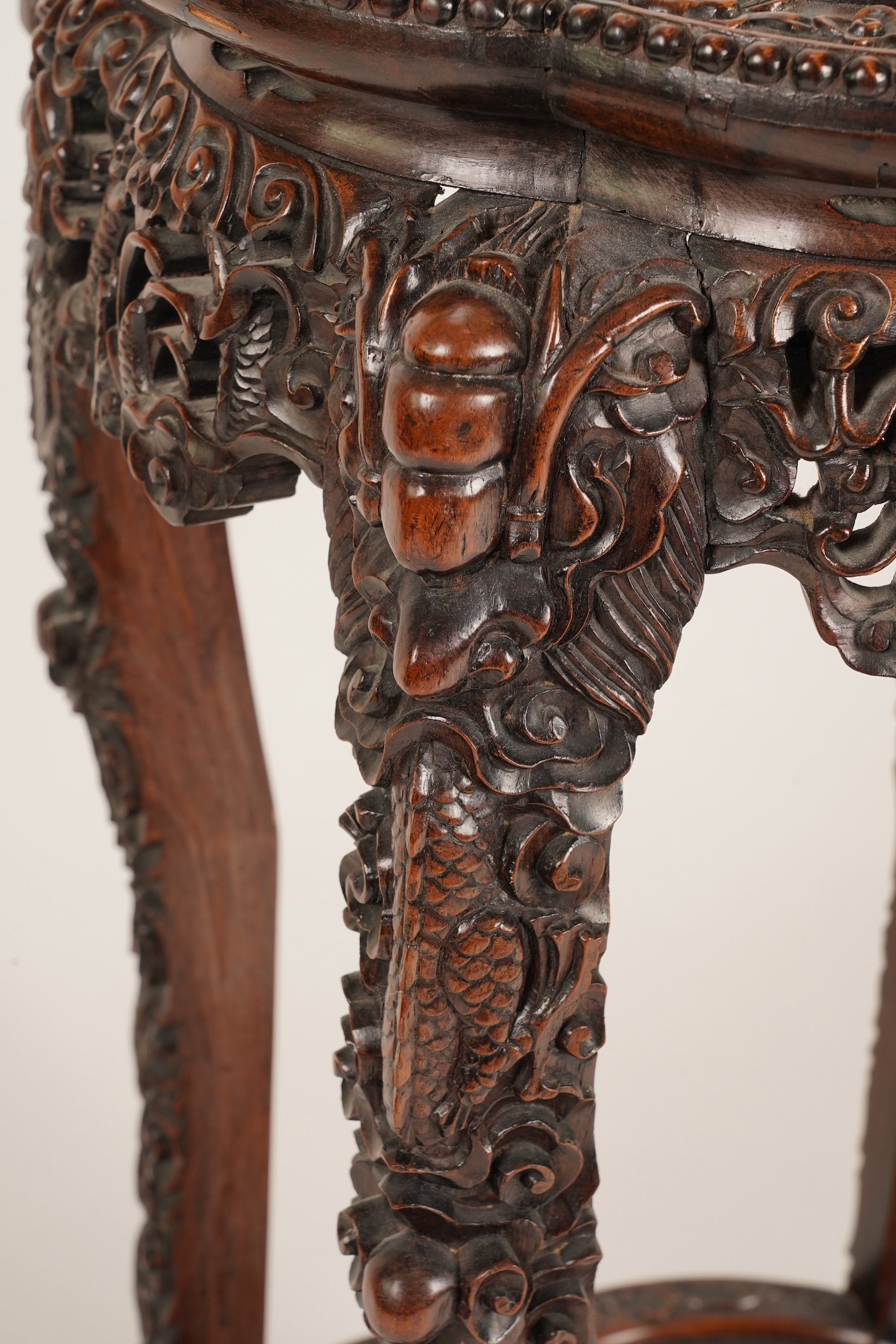 A Chinese hongmu and marble ‘dragon’ jardiniere stand, late 19th century